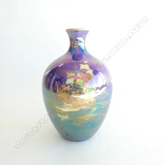 A Crown Devon vase, lustre blue-violet with galleon